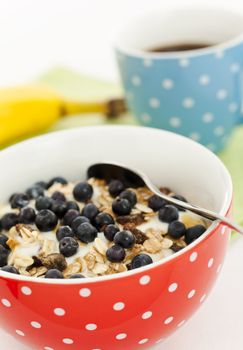 breakfast blueberry yoghurt with coffee and banana