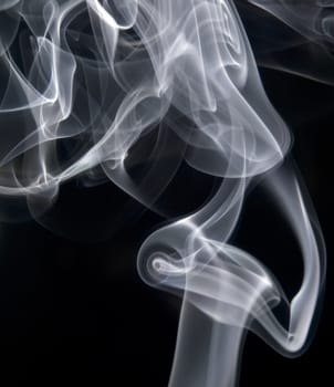 Abstract image of smoke trails frozen with off camera flash