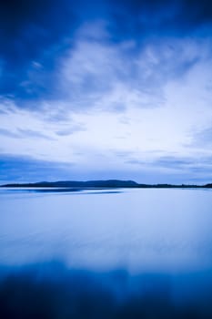 Sunset at the calm lake in finland