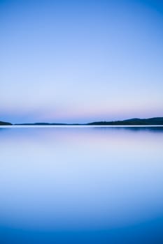 Sunset at the calm lake from Finland