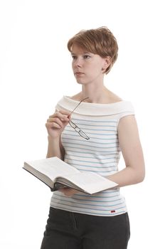 Girl holding the book and thinking