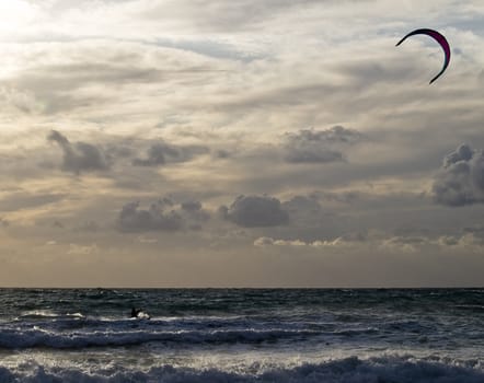 Golden Bay, Malta - 30 Jan 2010 - Man enjoying kite surfing at Golden Bay in Malta