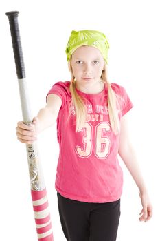 Isolated young girl giving softball bat to team mate