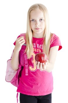 Young student handing over an apple