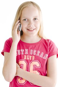 Young girl on the phone over white background