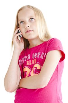 young girl speaking on the phone over white background