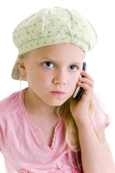 Young girl talking on the phone over white background