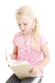 Young girl reading a book over white background