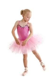 Young ballerina dancer over a white background