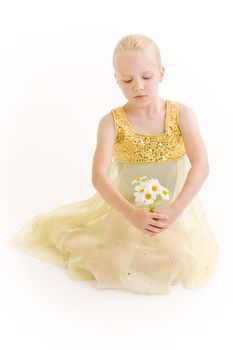 Young ballerina dancer over a white background