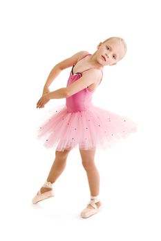 Young ballerina dancer over a white background