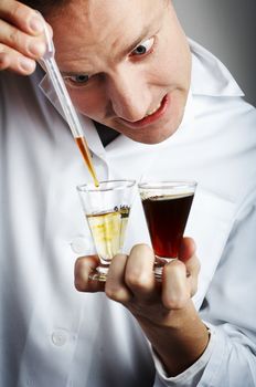 Mad scientist mixing a drink