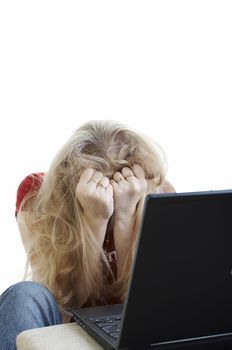 Girl having a nightmare with her laptop