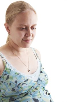 A pregnant young woman on a white background.