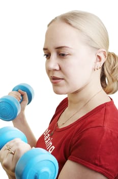 Young woman doing exercise on the gym 
