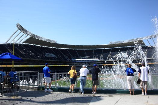 Fans watch baseball game through famous KC fountains