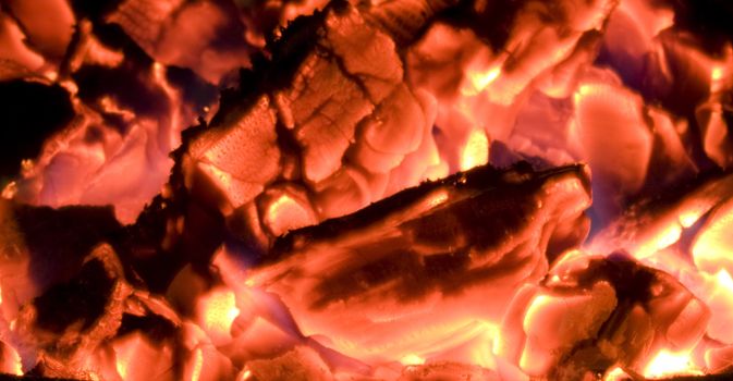 Hot glowing coals and embers.