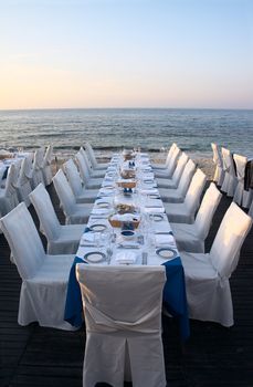 Restaurant tables served on the beach
