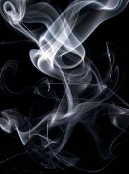 Abstract image of smoke trails frozen with off camera flash