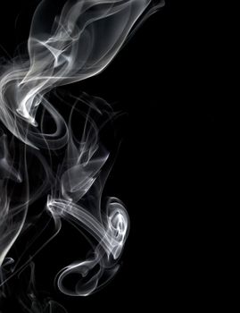 Abstract image of smoke trails frozen with off camera flash