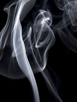 Abstract image of smoke trails frozen with off camera flash