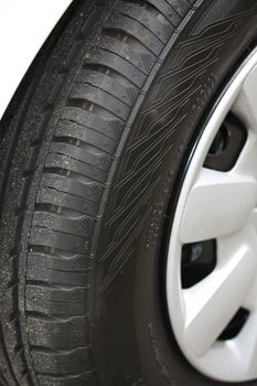 a close up of a new car tire