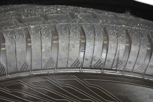 a close up of a new car tire