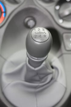 detail of a car interior, stick shift car