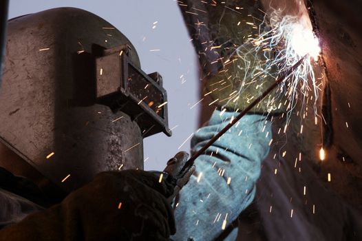 a arc welder busy at work