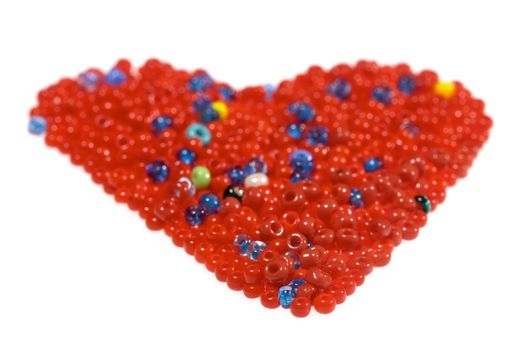 Heart made of glass beads, isolated on white