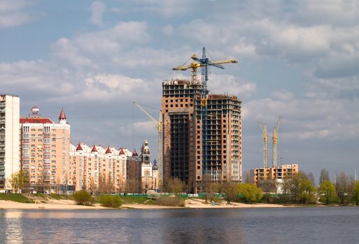 Building of new house on the lake coast