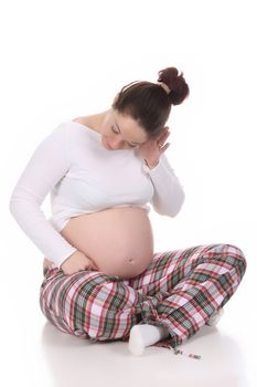 pregnant woman looking belly on white background