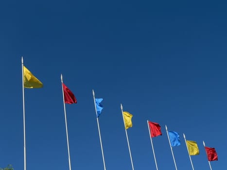 Flags on sky background