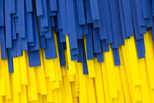 close-up of blue and yellow car wash brush
