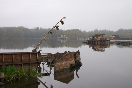 old metal construction in the river near of Chernobyl