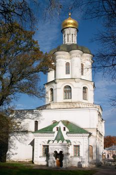 orthodoxy christianity church with gold cupola under blue sky