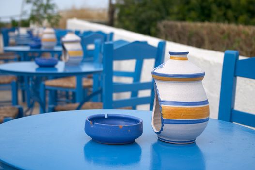 blue tables in cafe with ash tray scone
