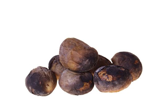 young potatoes are fried in embers isolated on white background