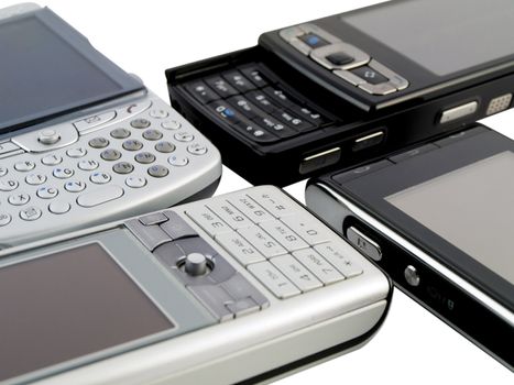 Stack of Several Modern Mobile Phones on White