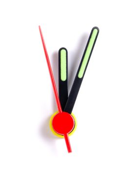 Close up of the hands of a clock, isolated on white, with the time shortly after midnight/midday.