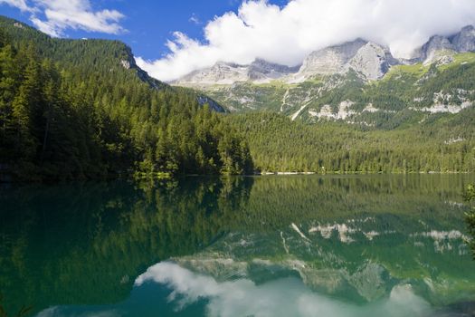 summer view of a beautiful lake in Italian alps