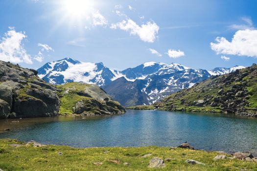 Summer view of Black Lake against the light, Trentino, Italy