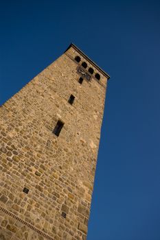 church tower made from sandstone on a blue sky