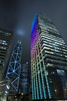 Hong Kong at night with highrise buildingsa