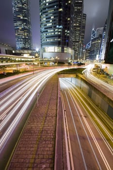 Hong Kong at night with highrise buildings
