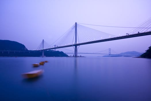 It is beautiful night scenes of Bridge in Hong Kong.