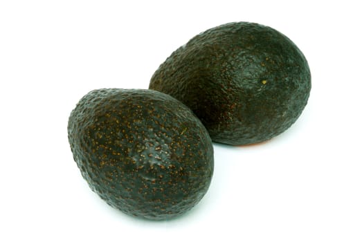 Two Whole Avocados on White Background