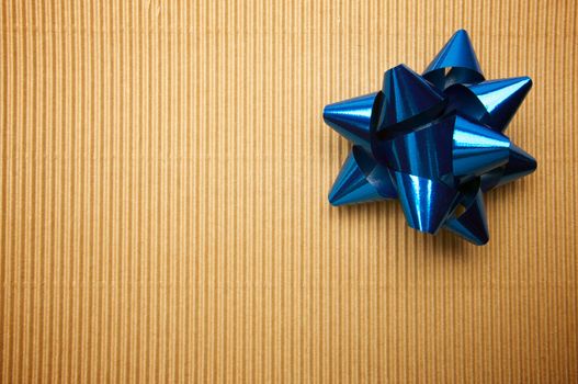 Corrugated Gift Box with a Blue Bow.