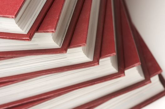 Burgundy Covered Stack of Books Close Up.