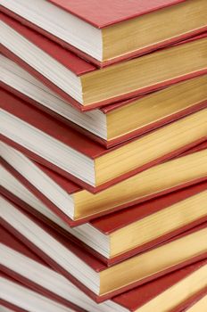 Burgundy Covered Stack of Books Close Up.